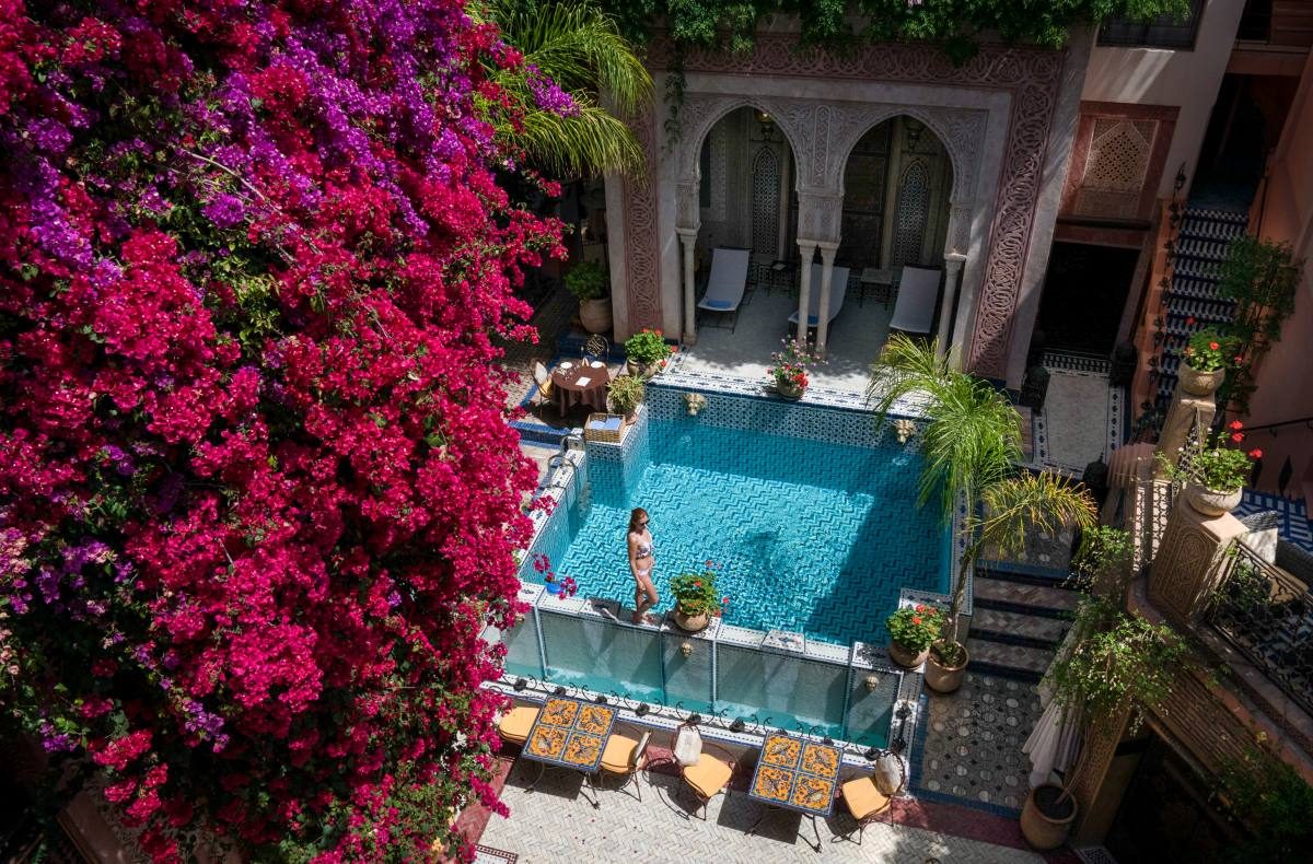 The tranquil courtyard of a riad in Marrakech, a peaceful escape from the bustling city streets.