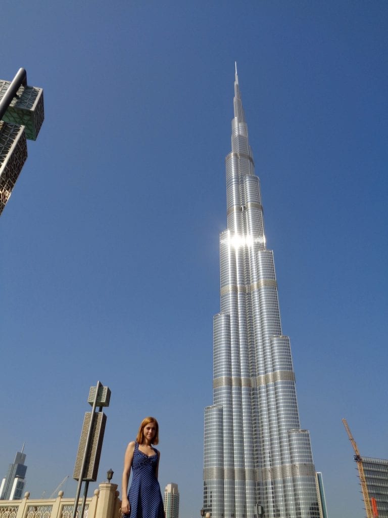 Tourist standing in front of Burj Khalifa