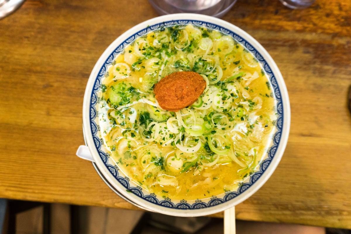 Bowl of creamy ramen, a staple dish to try in Tokyo.
