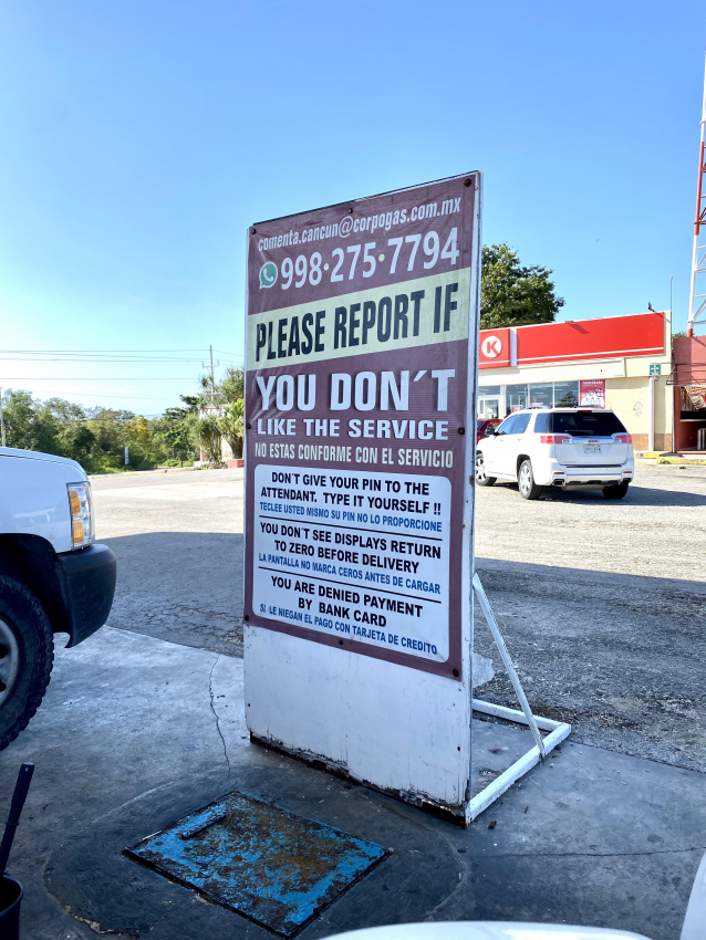 Informative sign at a Mexican gas station, a relevant stop for refueling when renting a car in Mexico.
