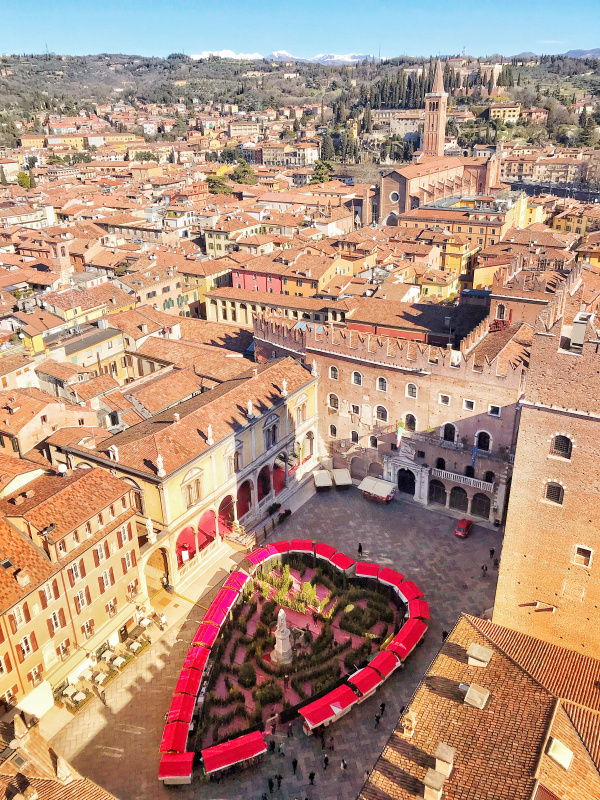 Overlooking Piazza dei Signori in Verona with its vibrant red roofs in the shape of a heart