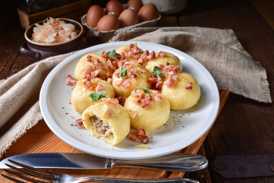 Kluski Śląskie, traditional Polish potato dumplings unique to Silesian cuisine, presented as an essential part of Poland's gastronomic culture.