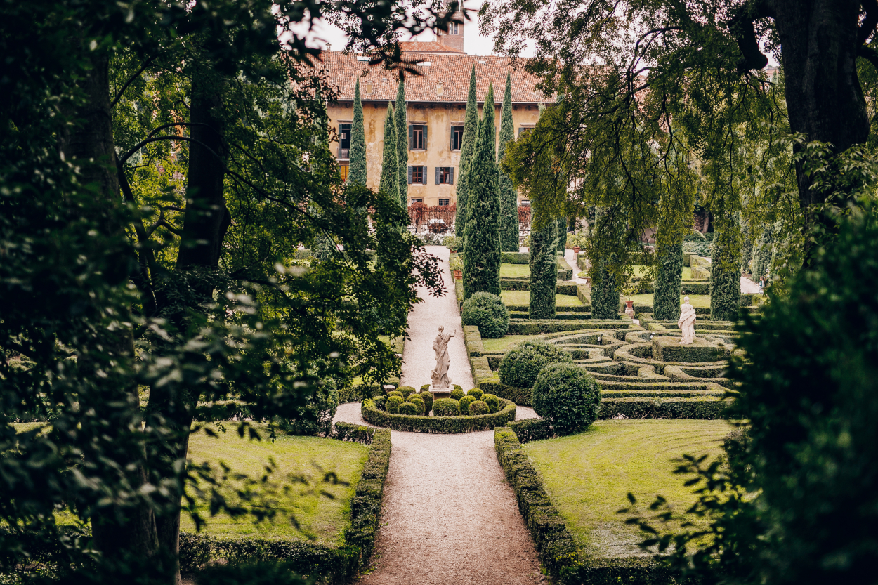 Lush green gardens of Giusti Palace and Garden in Verona, visiting here is a tranquil escape and a top thing to do.