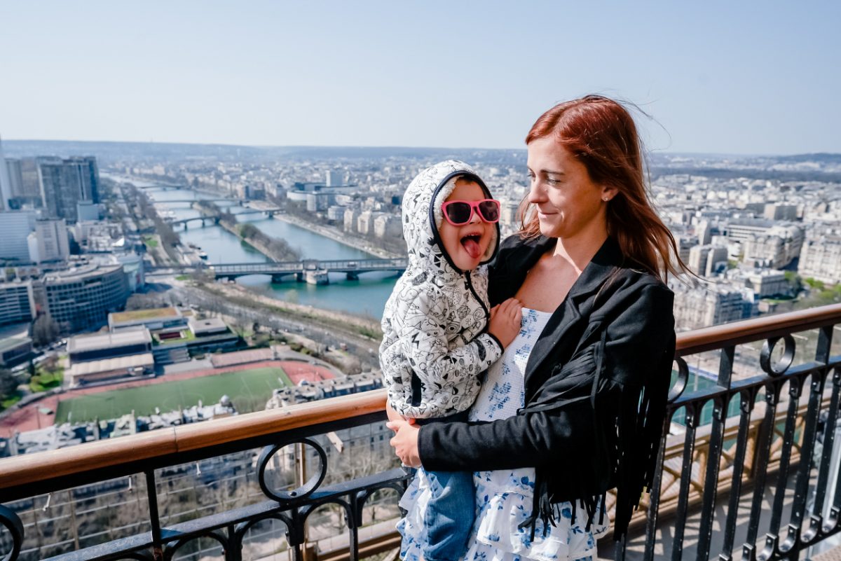 Mom and kid at the top of the Eiffel tower