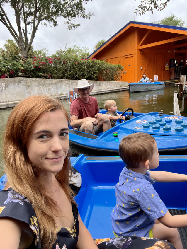 Family enjoying a boat ride with toddlers, exemplifying fun travel activities in the US for young children.