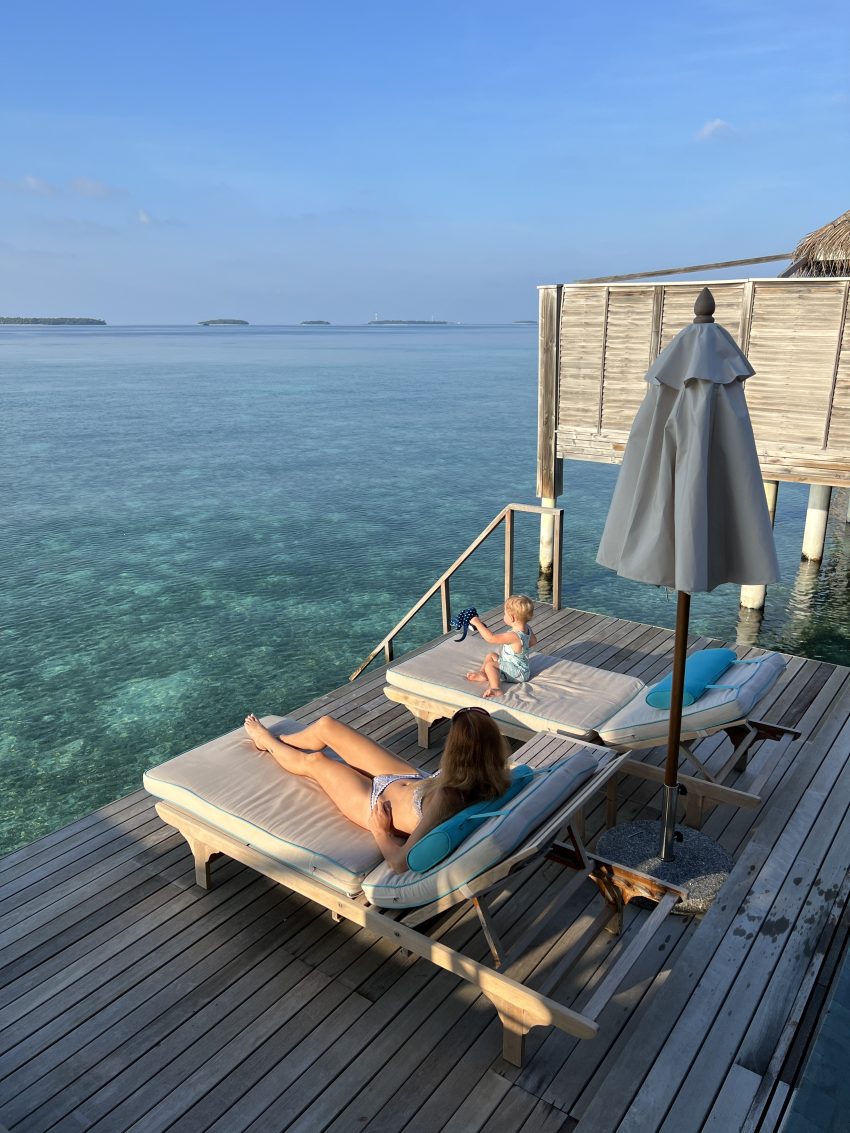 Overwater bungalow with toddler