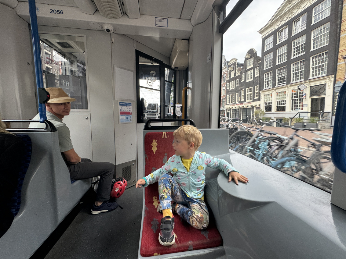 Public transport in Amsterdam with children on a tram